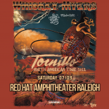 an image with a rust orange background showing Whiskey Myers tour artwork. There is a dessert scene with a large heart in the center of the image the text whiskey Myers tortilla North American tour 2022 Saturday 07/09 red hat amphitheater Raleigh is on the artwork in yellow text