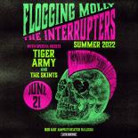 Photo of a green skull with purple Mohawk. Green and purple cover art reads: Flogging Molly The Interrupters with special guest Tiger Army and The Skints, Summer 2022,  June21. 