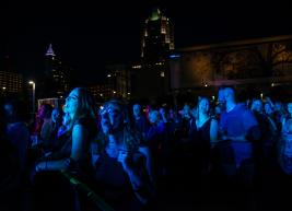 The crowd enjoying a nighttime show at Red Hat Amphitheater