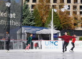 skaters on the rink at red hat amphitheater