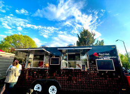 a photo of a food truck at red hat amphitheater