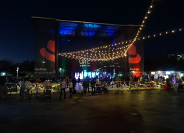 a photo of the rink at red hat amphitheater at night